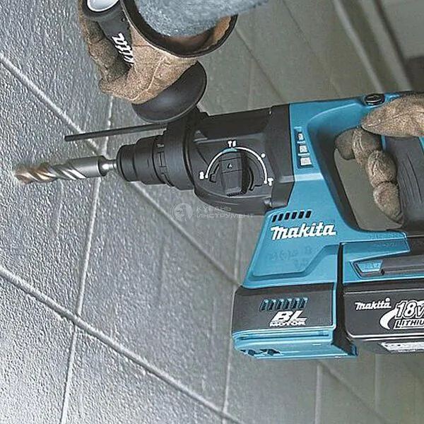 Аккумуляторный перфоратор Makita DHR 242 RFE  2*3 Ач